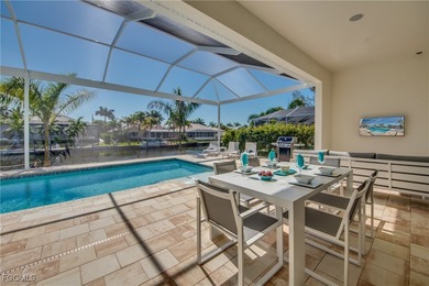 Experience true Florida living in this beautifully appointed on Royal Tee Country Club in Florida - for sale on GolfHomes.com, golf home, golf lot