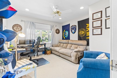 Welcome to your serene retreat in the sought-after beach town of on Oyster Bay Golf Links in North Carolina - for sale on GolfHomes.com, golf home, golf lot