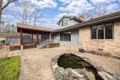 Nestled in the heart of Willow Oaks, this stunning Craftsman on Willow Oaks Country Club in Virginia - for sale on GolfHomes.com, golf home, golf lot