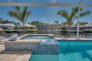 Experience true Florida living in this beautifully appointed on Royal Tee Country Club in Florida - for sale on GolfHomes.com, golf home, golf lot