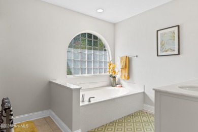 Welcome to your serene retreat in the sought-after beach town of on Oyster Bay Golf Links in North Carolina - for sale on GolfHomes.com, golf home, golf lot