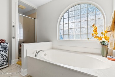 Welcome to your serene retreat in the sought-after beach town of on Oyster Bay Golf Links in North Carolina - for sale on GolfHomes.com, golf home, golf lot