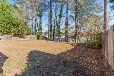 Welcome to this beautifully 4-bedroom, 2.5-bath home offering 1 on Sugar Creek Golf Course in Georgia - for sale on GolfHomes.com, golf home, golf lot