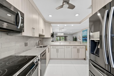 Welcome to the heart of Boca Raton!  This move-in ready home on Boca Lago Golf and Country Club in Florida - for sale on GolfHomes.com, golf home, golf lot