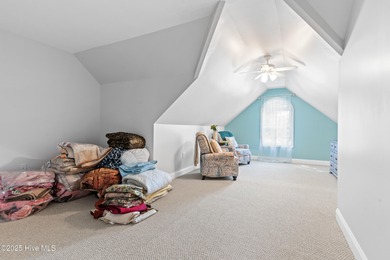 Welcome to your serene retreat in the sought-after beach town of on Oyster Bay Golf Links in North Carolina - for sale on GolfHomes.com, golf home, golf lot