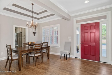 Experience luxury living at its finest in this exquisite on River Landing Golf Course in North Carolina - for sale on GolfHomes.com, golf home, golf lot