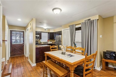 Beautiful Lake Arrowhead setting for this terrific 2 bed 2 1/2 on The Highlands Course at Lake Arrowhead in Georgia - for sale on GolfHomes.com, golf home, golf lot