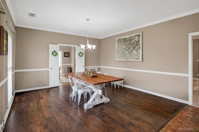 Exceptional curb appeal welcomes you to this beautiful 2,616 sq on Cottonwood Golf Club in Alabama - for sale on GolfHomes.com, golf home, golf lot