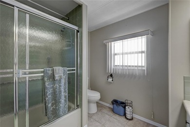 This smart SPLIT FLOOR PLAN, well maintained double wide on Maple Leaf Golf and Country Club in Florida - for sale on GolfHomes.com, golf home, golf lot