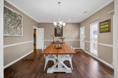 Exceptional curb appeal welcomes you to this beautiful 2,616 sq on Cottonwood Golf Club in Alabama - for sale on GolfHomes.com, golf home, golf lot