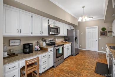 Exceptional curb appeal welcomes you to this beautiful 2,616 sq on Cottonwood Golf Club in Alabama - for sale on GolfHomes.com, golf home, golf lot