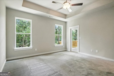 ONLY A FEW HOMES REMAIN IN THE LINKS SECTION OF TRADITOINS OF on Traditions of Braselton Golf Club in Georgia - for sale on GolfHomes.com, golf home, golf lot