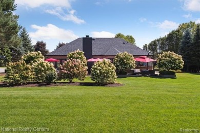 Nestled in the prestigious Prestwick Village Golf Course on Prestwick Village Golf Club in Michigan - for sale on GolfHomes.com, golf home, golf lot