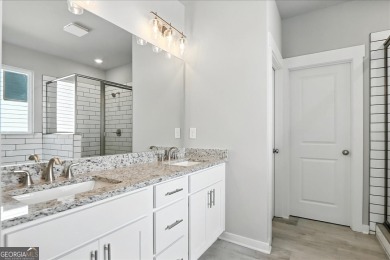 ONLY A FEW HOMES REMAIN IN THE LINKS SECTION OF TRADITOINS OF on Traditions of Braselton Golf Club in Georgia - for sale on GolfHomes.com, golf home, golf lot