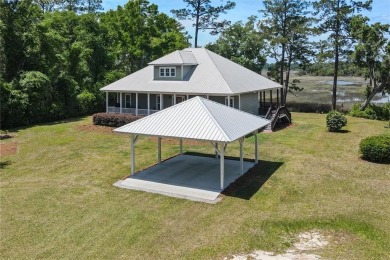 Welcome to this impeccably maintained 4-bed, 3-bath home w/ on Sapelo Hammock Golf Club in Georgia - for sale on GolfHomes.com, golf home, golf lot