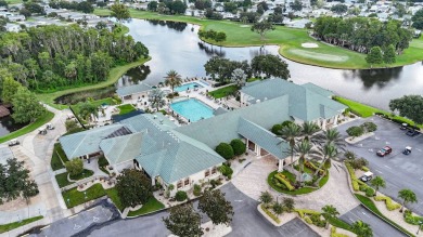 Welcome to luxury living in the heart of the prestigious 55+ on Crane Lakes Golf and Country Club in Florida - for sale on GolfHomes.com, golf home, golf lot