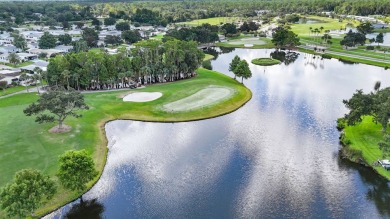 Welcome to luxury living in the heart of the prestigious 55+ on Crane Lakes Golf and Country Club in Florida - for sale on GolfHomes.com, golf home, golf lot