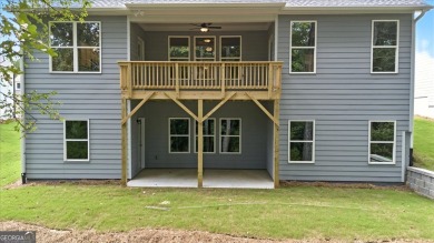 ONLY A FEW HOMES REMAIN IN THE LINKS SECTION OF TRADITOINS OF on Traditions of Braselton Golf Club in Georgia - for sale on GolfHomes.com, golf home, golf lot