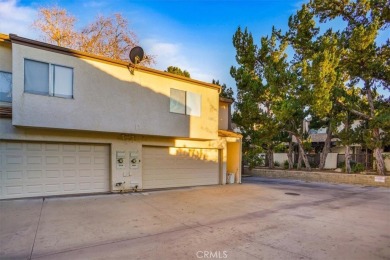 Highly Coveted Two-Story End-Unit Townhome in Valencia Fairways on Vista Valencia Golf Course in California - for sale on GolfHomes.com, golf home, golf lot