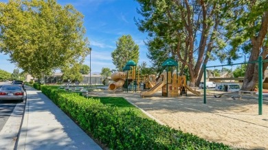 Highly Coveted Two-Story End-Unit Townhome in Valencia Fairways on Vista Valencia Golf Course in California - for sale on GolfHomes.com, golf home, golf lot