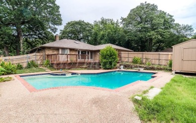 Step into this beautifully updated 4-bedroom, 3-bath home on Texas Rangers Golf Club  in Texas - for sale on GolfHomes.com, golf home, golf lot