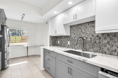 Updated 2-bedroom, 2-bath condo in the beautiful gated community on Wynmoor Golf Course in Florida - for sale on GolfHomes.com, golf home, golf lot