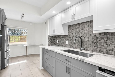 Updated 2-bedroom, 2-bath condo in the beautiful gated community on Wynmoor Golf Course in Florida - for sale on GolfHomes.com, golf home, golf lot