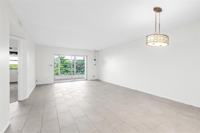 Updated 2-bedroom, 2-bath condo in the beautiful gated community on Wynmoor Golf Course in Florida - for sale on GolfHomes.com, golf home, golf lot