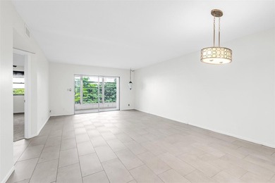 Updated 2-bedroom, 2-bath condo in the beautiful gated community on Wynmoor Golf Course in Florida - for sale on GolfHomes.com, golf home, golf lot