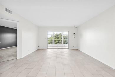 Updated 2-bedroom, 2-bath condo in the beautiful gated community on Wynmoor Golf Course in Florida - for sale on GolfHomes.com, golf home, golf lot