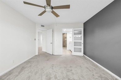 Updated 2-bedroom, 2-bath condo in the beautiful gated community on Wynmoor Golf Course in Florida - for sale on GolfHomes.com, golf home, golf lot