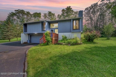 Welcome to 299 Echo Lake Rd, a striking mid-century modern-style on Pocono Farms Country Club in Pennsylvania - for sale on GolfHomes.com, golf home, golf lot