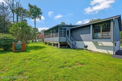 Welcome to 299 Echo Lake Rd, a striking mid-century modern-style on Pocono Farms Country Club in Pennsylvania - for sale on GolfHomes.com, golf home, golf lot
