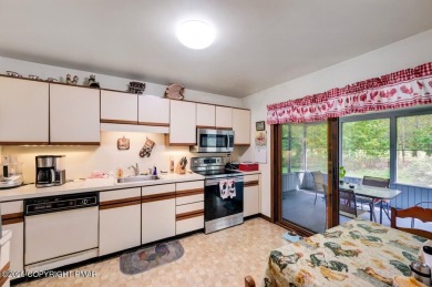 Welcome to 299 Echo Lake Rd, a striking mid-century modern-style on Pocono Farms Country Club in Pennsylvania - for sale on GolfHomes.com, golf home, golf lot
