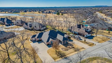 Wonderful home located in a private, gated community. Large lot on Pecan Plantation Country Club in Texas - for sale on GolfHomes.com, golf home, golf lot