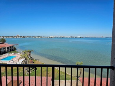 WOW VIEW! Wake up to the open waters of Boca Ciega Bay every on Isla Del Sol Yacht and Country Club in Florida - for sale on GolfHomes.com, golf home, golf lot