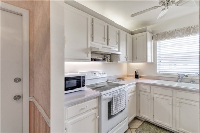 Fully Furnished, turnkey, end unit overlooking the 4th tee and on The American Golf Club in Florida - for sale on GolfHomes.com, golf home, golf lot