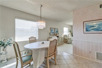 Fully Furnished, turnkey, end unit overlooking the 4th tee and on The American Golf Club in Florida - for sale on GolfHomes.com, golf home, golf lot