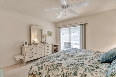 Fully Furnished, turnkey, end unit overlooking the 4th tee and on The American Golf Club in Florida - for sale on GolfHomes.com, golf home, golf lot