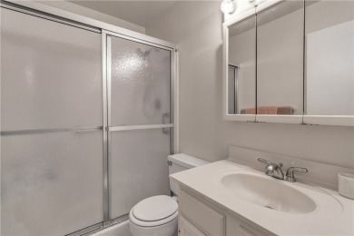 Fully Furnished, turnkey, end unit overlooking the 4th tee and on The American Golf Club in Florida - for sale on GolfHomes.com, golf home, golf lot
