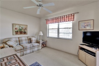 Fully Furnished, turnkey, end unit overlooking the 4th tee and on The American Golf Club in Florida - for sale on GolfHomes.com, golf home, golf lot