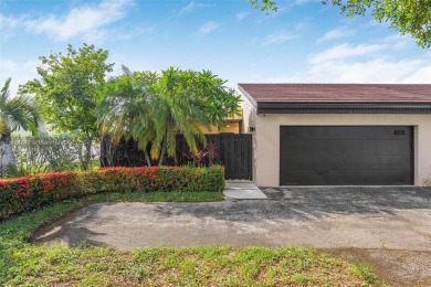 Stunning corner 2/2 townhome located in the desirable Country on Country Club of Miami in Florida - for sale on GolfHomes.com, golf home, golf lot