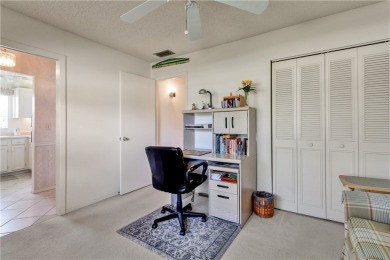Fully Furnished, turnkey, end unit overlooking the 4th tee and on The American Golf Club in Florida - for sale on GolfHomes.com, golf home, golf lot