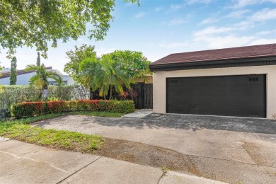 Stunning corner 2/2 townhome located in the desirable Country on Country Club of Miami in Florida - for sale on GolfHomes.com, golf home, golf lot