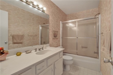 Fully Furnished, turnkey, end unit overlooking the 4th tee and on The American Golf Club in Florida - for sale on GolfHomes.com, golf home, golf lot