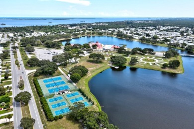 This is your opportunity to own a special home. The updated on Barefoot Bay Golf Course in Florida - for sale on GolfHomes.com, golf home, golf lot