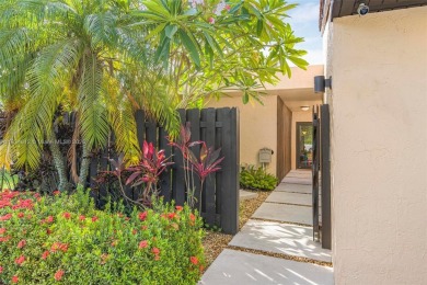 Stunning corner 2/2 townhome located in the desirable Country on Country Club of Miami in Florida - for sale on GolfHomes.com, golf home, golf lot