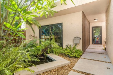 Stunning corner 2/2 townhome located in the desirable Country on Country Club of Miami in Florida - for sale on GolfHomes.com, golf home, golf lot