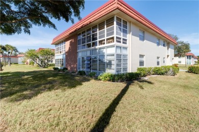 Fully Furnished, turnkey, end unit overlooking the 4th tee and on The American Golf Club in Florida - for sale on GolfHomes.com, golf home, golf lot