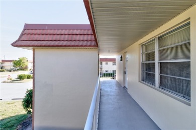 Fully Furnished, turnkey, end unit overlooking the 4th tee and on The American Golf Club in Florida - for sale on GolfHomes.com, golf home, golf lot